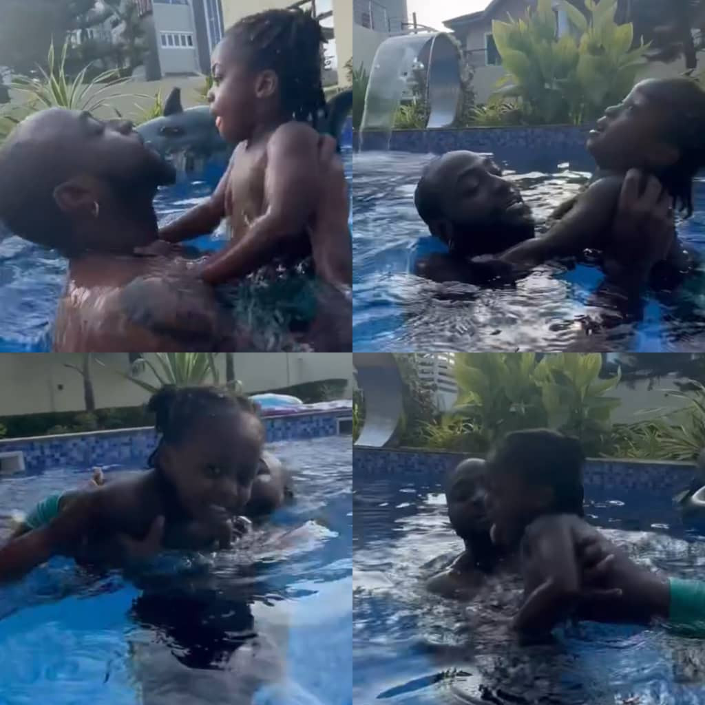 Lovely video of singer Davido giving his son, Ifeanyi, swimming lessons