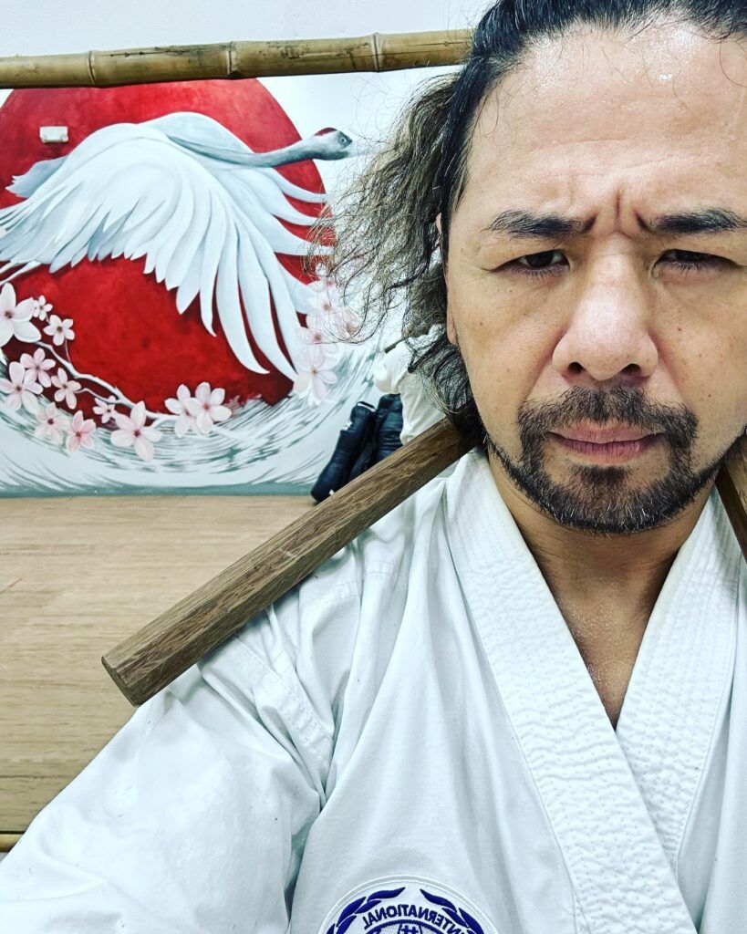 Shinsuke Nakamura training on karate ground