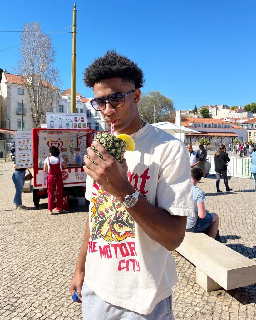 Jace Howard enjoys pineapple in Lisbon, Portugal